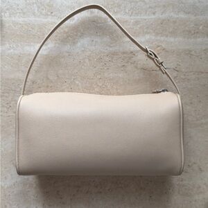 The row 90s bag sand close to ivory